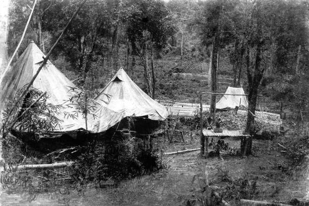 The isolation hospital area for cholera sufferers, Shimo Songkurai. The patients were housed under canvas to the left of the photo. In the centre is the operating table used for amputations, ulcer treatment and post-mortems. [Photo by George Aspinall, by courtesy Tim Bowden]